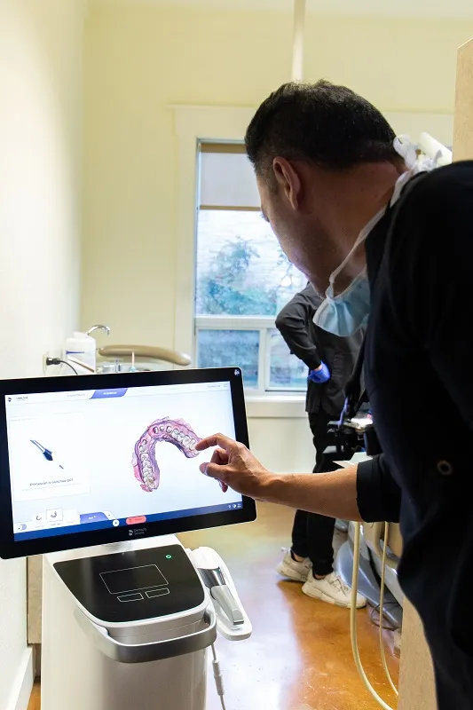 Doctor examining dental screen